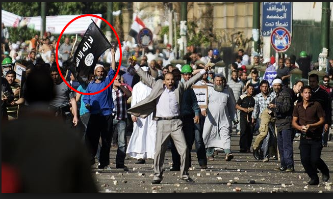 Brotherhood supporters carrying AlQaeda Flag in Egypt 12/10/2013