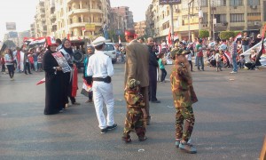 Egyptian Children wearing police and military uniforms celebrating 6 october war victory