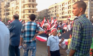 Egyptians carrying the Egyptian flag
