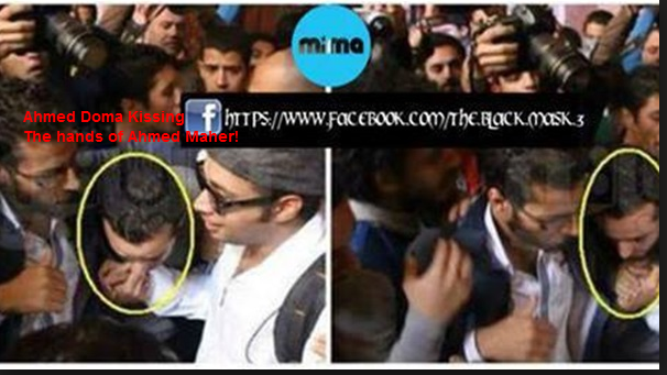 Ahmed Doma kissing Ahmed Maher Hands