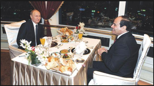 Presidents Putin and Alsisi having dinner at the cairo tower
